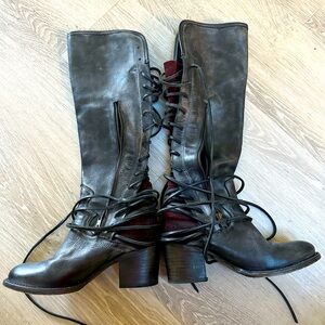 Gorgeous lace up knee high boots by Steven